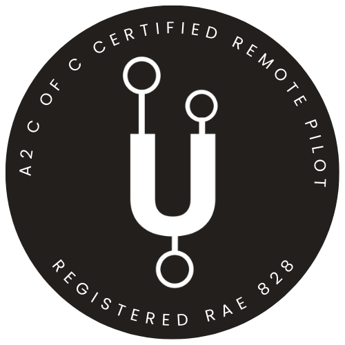 Logo displaying "A2 C of C Certified Remote Pilot" with graphical elements and registration number.